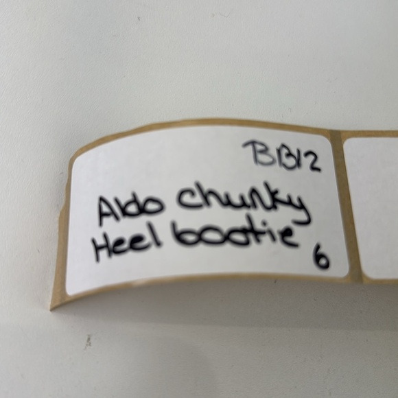 Aldo Black Ankle Boots with Sleek Design and Side Zippers - Picture 7 of 10